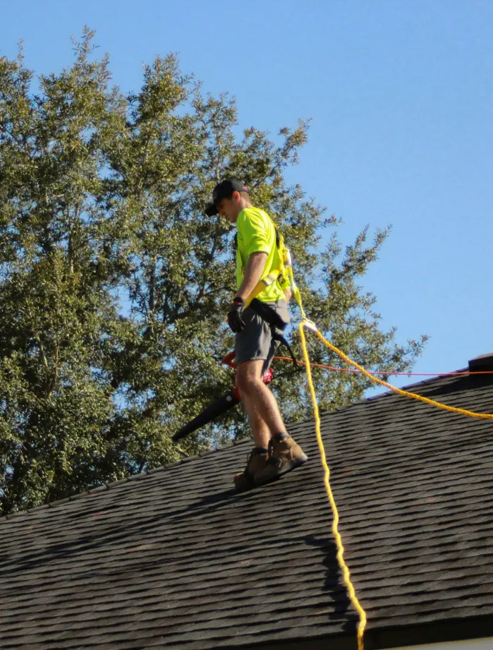 Man repairing a roof