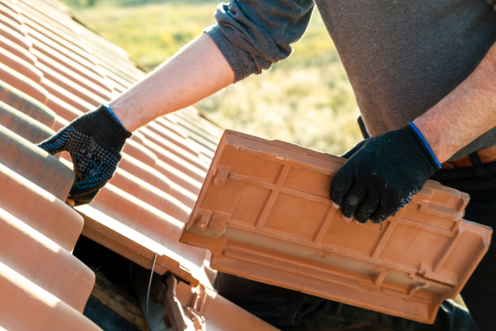 Man Holding Shingles